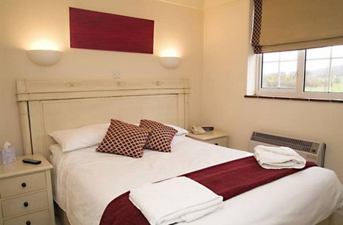 Imagen de la habitación del Hotel The Peacock Country Inn. Foto 10