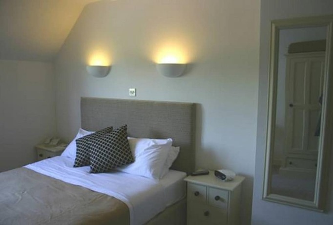 Imagen de la habitación del Hotel The Peacock Country Inn. Foto 16