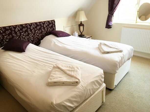 Imagen de la habitación del Hotel The Peacock Country Inn. Foto 18