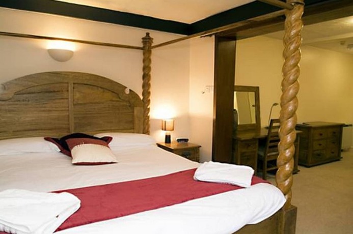 Imagen de la habitación del Hotel The Peacock Country Inn. Foto 19