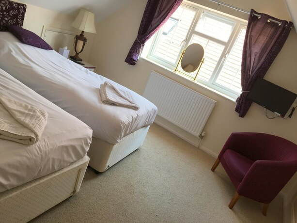 Imagen de la habitación del Hotel The Peacock Country Inn. Foto 20