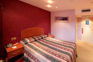 Imagen de la habitación del Hotel The Peacock Townhouse. Foto 5