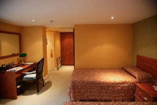 Imagen de la habitación del Hotel The Peacock Townhouse. Foto 6