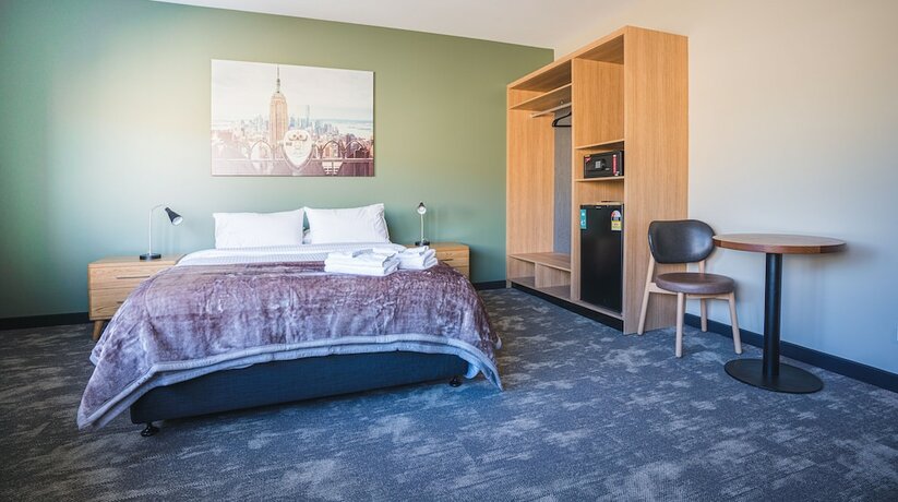 Imagen de la habitación del Hotel The Peakhurst. Foto 17