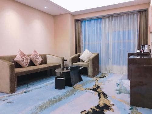 Imagen de la habitación del Hotel The Pearl Boutique. Foto 10