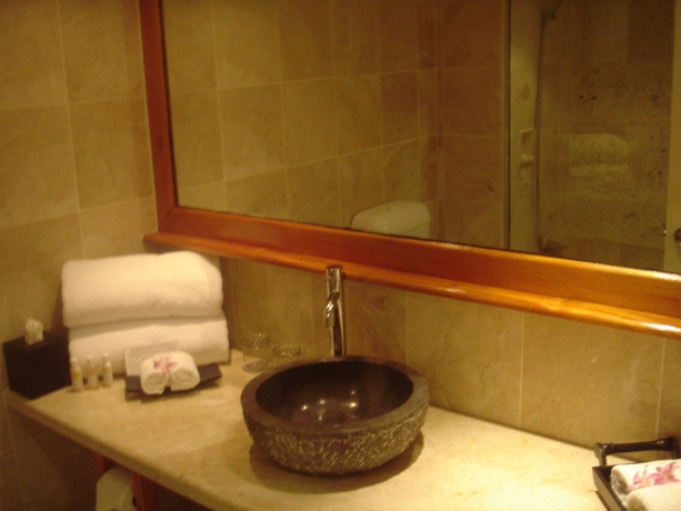 Imagen de la habitación del Hotel The Pearl South Pacific Resort. Foto 8