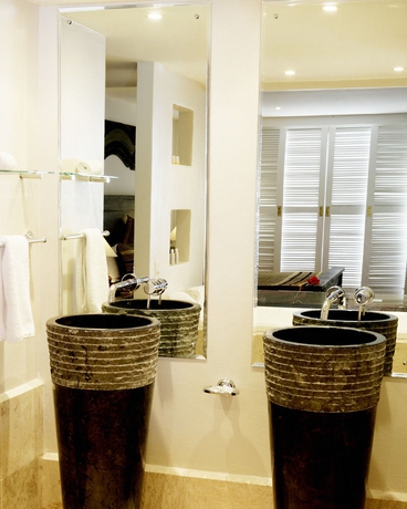 Imagen de la habitación del Hotel The Pearl South Pacific Resort. Foto 9