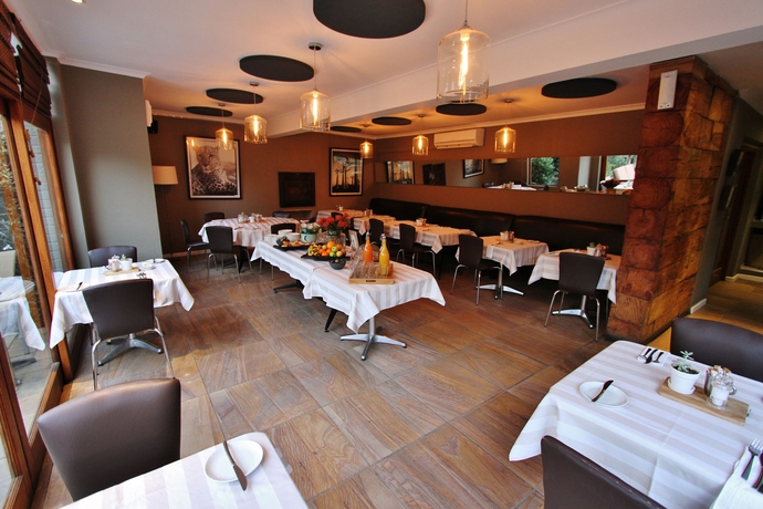 Imagen del bar/restaurante del Hotel The Peech. Foto 2