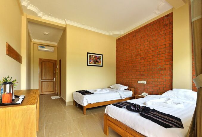 Imagen de la habitación del Hotel The Pegu Lodge. Foto 18