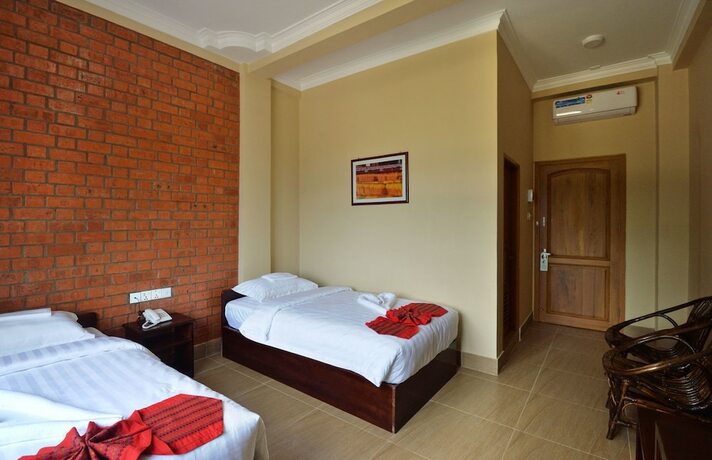 Imagen de la habitación del Hotel The Pegu Lodge. Foto 20