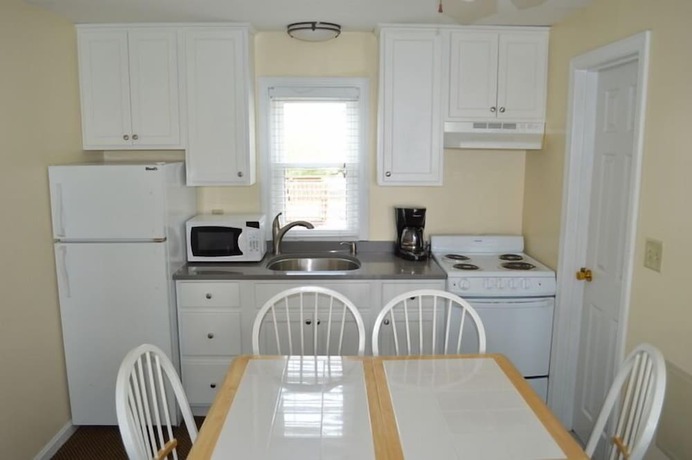 Imagen de la habitación del Hotel The Pelham Resort Motel. Foto 3