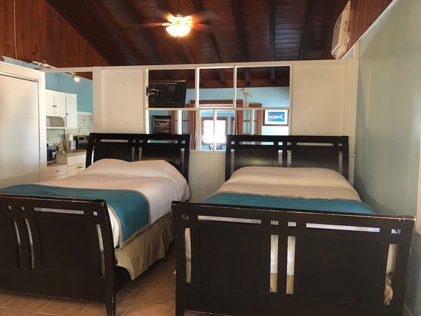 Imagen de la habitación del Hotel The Pelican Key Largo Cottages. Foto 2
