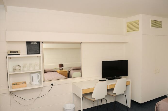 Imagen de la habitación del Hotel The Peninsula Motor Inn. Foto 7