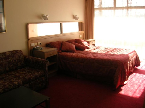 Imagen de la habitación del Hotel The Peninsula Motor Inn. Foto 8