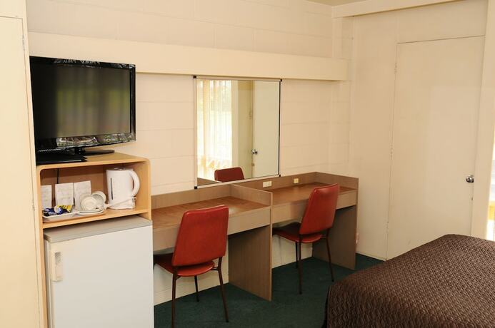 Imagen de la habitación del Hotel The Peninsula Motor Inn. Foto 10