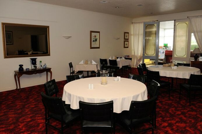 Imagen del bar/restaurante del Hotel The Peninsula Motor Inn. Foto 4