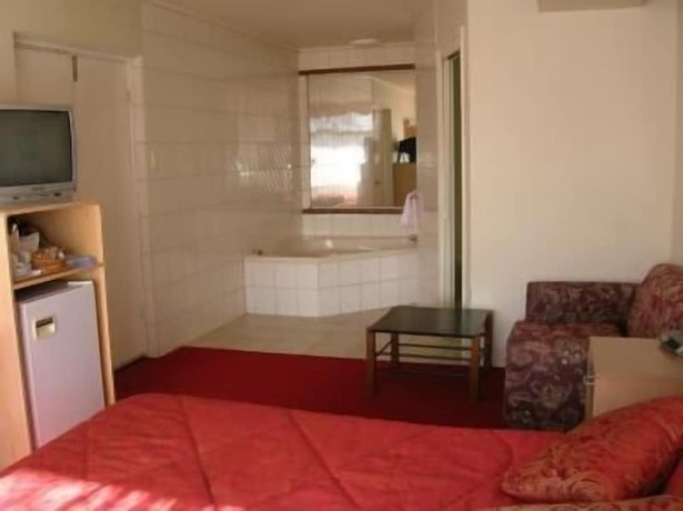 Imagen de la habitación del Hotel The Peninsula Motor Inn. Foto 11