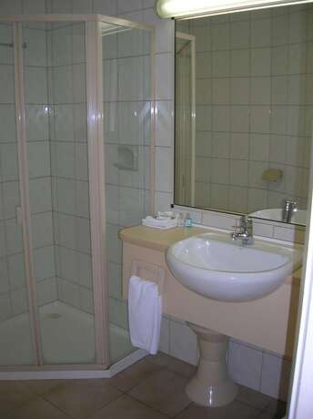 Imagen de la habitación del Hotel The Peninsula Motor Inn. Foto 13