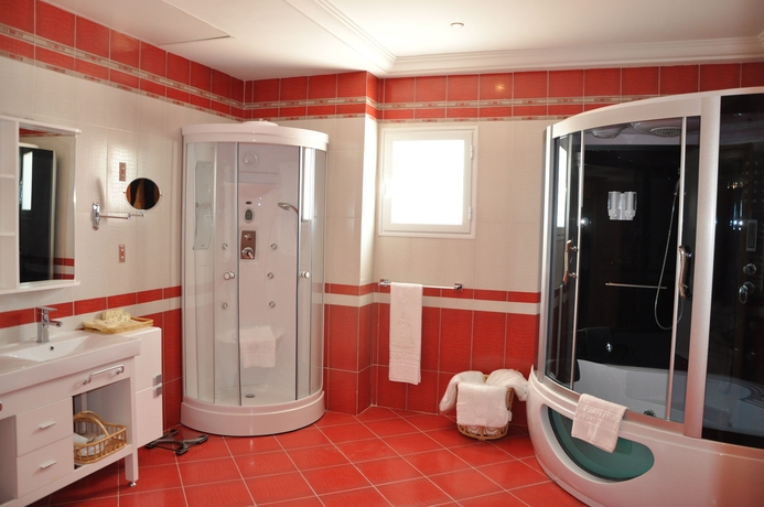 Imagen de la habitación del Hotel The Penthouse Suites. Foto 7