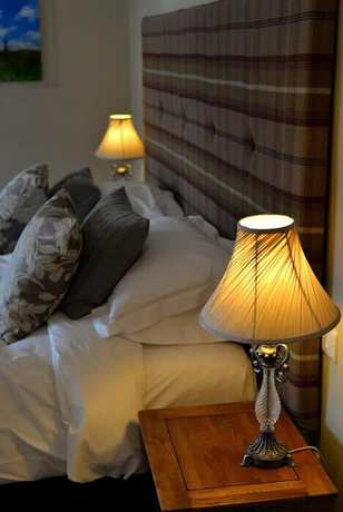Imagen de la habitación del Hotel The Peppermill. Foto 4