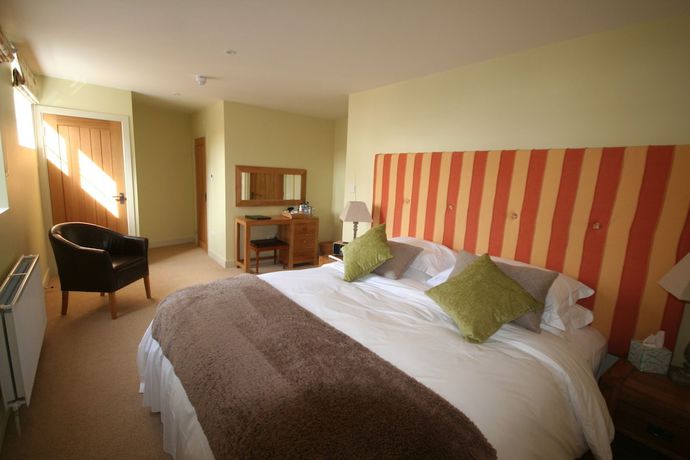 Imagen de la habitación del Hotel The Peppermill. Foto 5