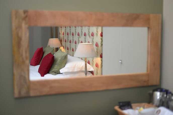 Imagen de la habitación del Hotel The Peppermill. Foto 6