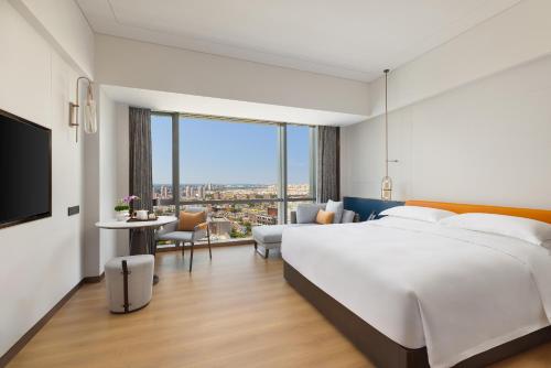 Imagen de la habitación del Hotel The Perennial Tianjin, A Jdv By Hyatt. Foto 16