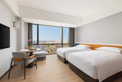 Imagen de la habitación del Hotel The Perennial Tianjin, A Jdv By Hyatt. Foto 17