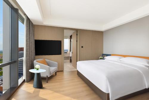 Imagen de la habitación del Hotel The Perennial Tianjin, A Jdv By Hyatt. Foto 19
