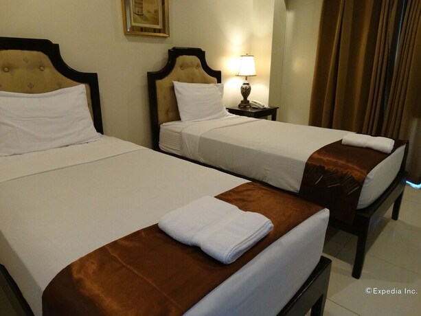 Imagen de la habitación del Hotel The Peridot Suites. Foto 7