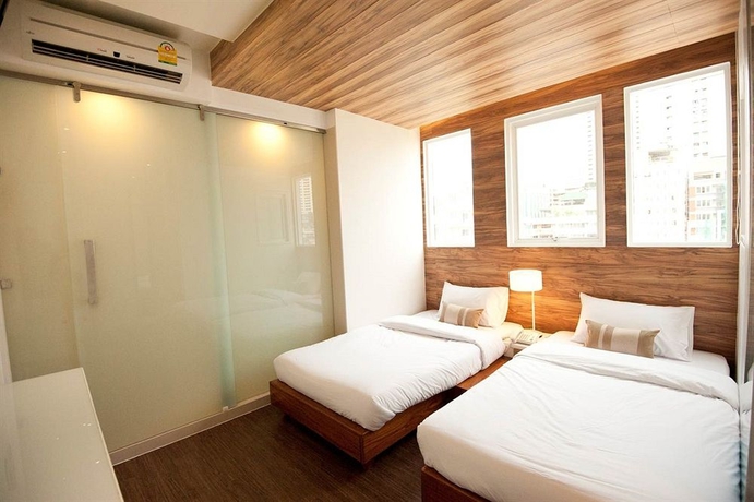 Imagen de la habitación del Hotel The Period Pratunam. Foto 8