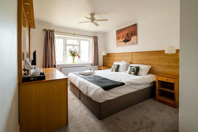 Imagen de la habitación del Hotel The Pheasant Bar and Restaurant. Foto 20