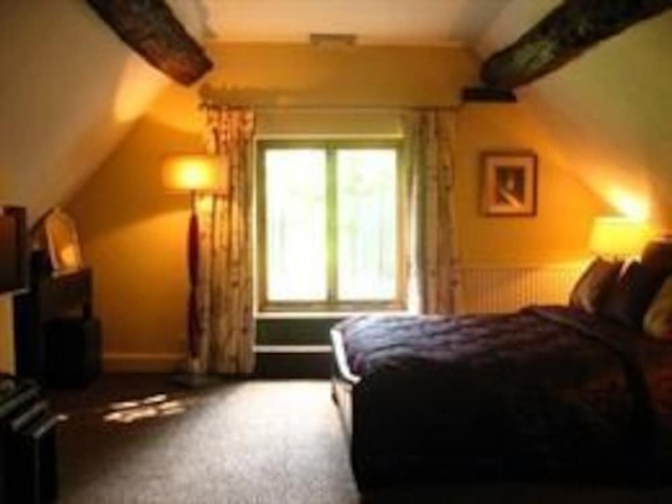 Imagen de la habitación del Hotel The Pheasant Inn, Chester. Foto 11