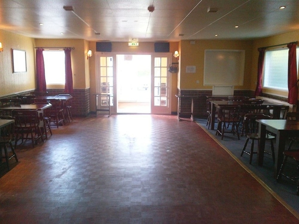 Imagen del bar/restaurante del Hotel The Pheasant Inn, Dunstable. Foto 2