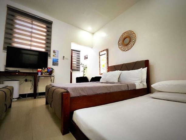 Imagen de la habitación del Hotel The Philip Ann Resort. Foto 7
