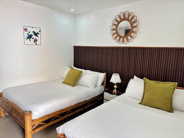 Imagen de la habitación del Hotel The Philip Ann Resort. Foto 11