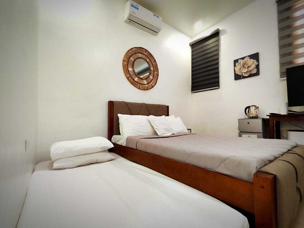 Imagen de la habitación del Hotel The Philip Ann Resort. Foto 14