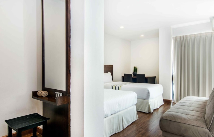 Imagen de la habitación del Hotel The Phoenix Bangkok. Foto 3