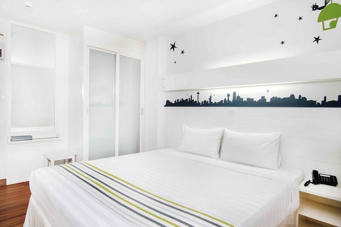 Imagen de la habitación del Hotel The Phoenix Bangkok. Foto 5