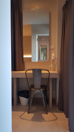 Imagen de la habitación del Hotel The Phoenix Bangkok. Foto 9