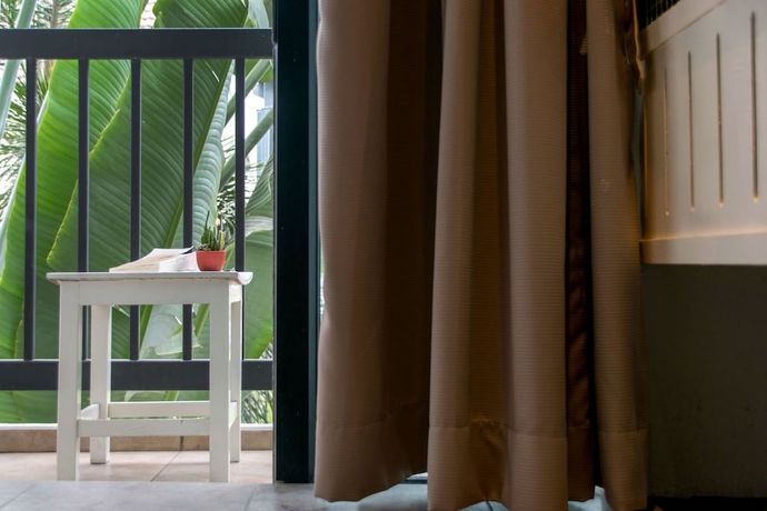 Imagen de la habitación del Hotel The Phoenix Bangkok. Foto 11