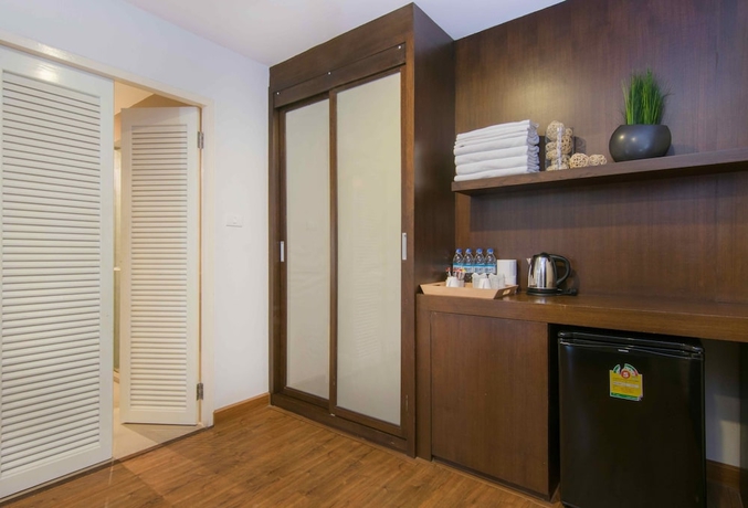 Imagen de la habitación del Hotel The Phoenix Bangkok. Foto 12