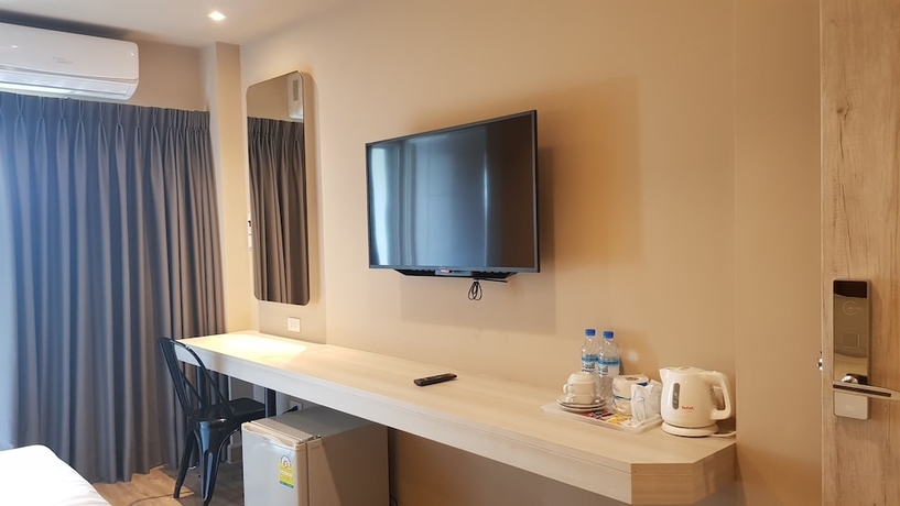 Imagen de la habitación del Hotel The Phoenix Bangkok. Foto 13