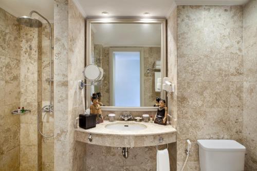 Imagen de la habitación del Hotel The Phoenix Hotel Yogyakarta - Handwritten Collection. Foto 12