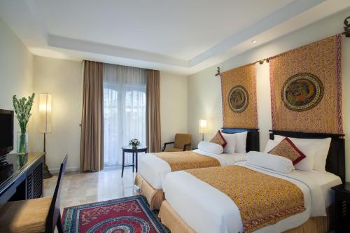 Imagen de la habitación del Hotel The Phoenix Hotel Yogyakarta - Handwritten Collection. Foto 17