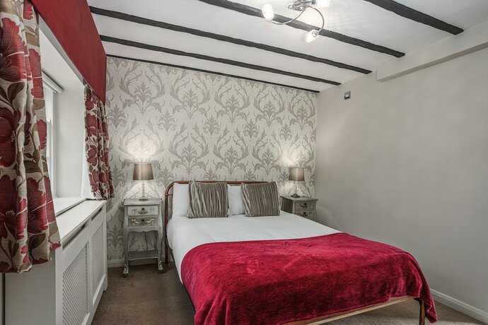 Imagen de la habitación del Hotel The Pied Bull. Foto 17