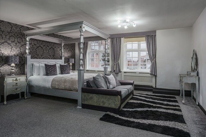Imagen de la habitación del Hotel The Pied Bull. Foto 19