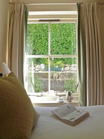 Imagen de la habitación del Hotel The Pierhouse. Foto 4