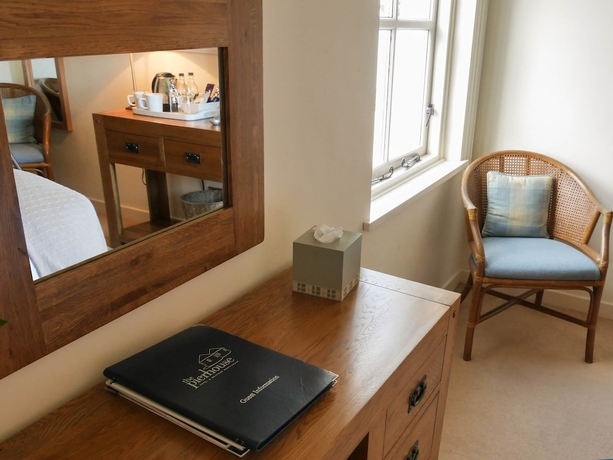 Imagen de la habitación del Hotel The Pierhouse. Foto 8