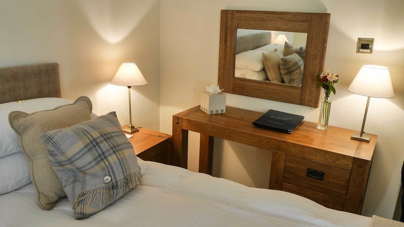 Imagen de la habitación del Hotel The Pierhouse. Foto 12